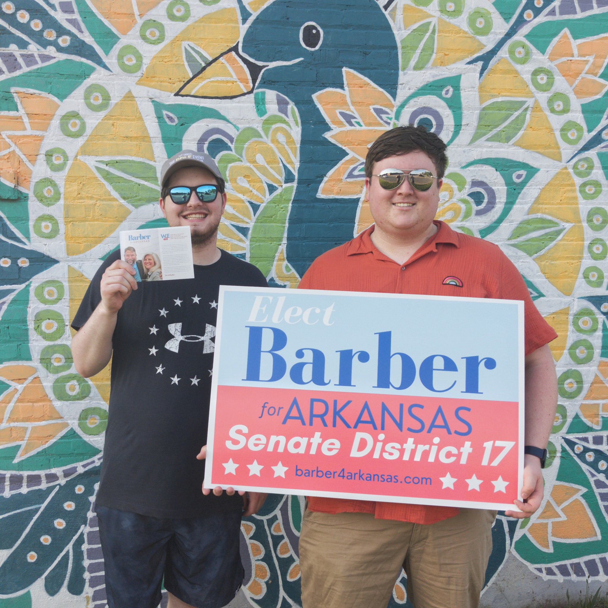 Volunteers with Barber for Arkansas sign